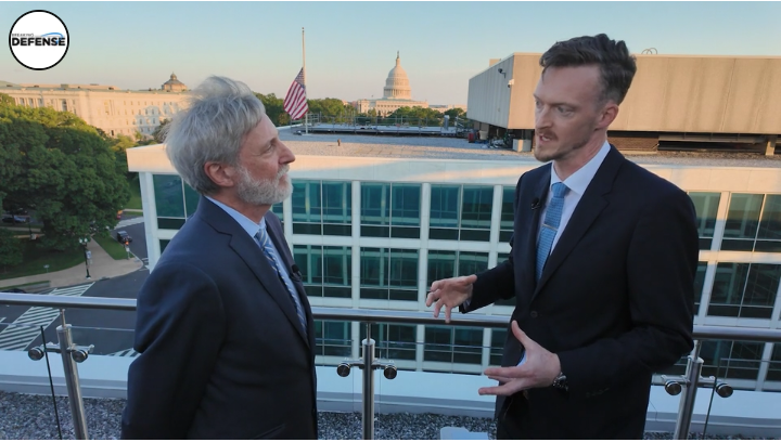 phil potter being interviewed outside a building in dc